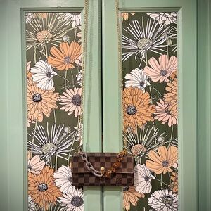 Louis Vuitton Brown Checkered wallet with added gold chain and acrylic chain